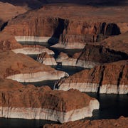 Lake Powell At Historic Low Levels In Drought-Stricken West page, arizona june 24 in this aerial view, the tall bleached "bathtub ring" is visible on the rocky banks of lake powell on june 24, 2021 in page, arizona as severe drought grips parts of the western united states, a below average flow of water is expected to flow through the colorado river basin into two of its biggest reservoirs, lake powell and lake mead lake powell is currently at 3456 percent of capacity, a historic low the lake stands at 13891 feet below full pool and has dropped 44 feet in the past year the colorado river basin supplies water to 40 million people in seven western states photo by justin sullivangetty images