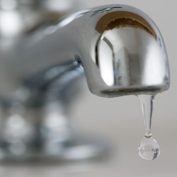 Water Drips From Domestic Tap, UK