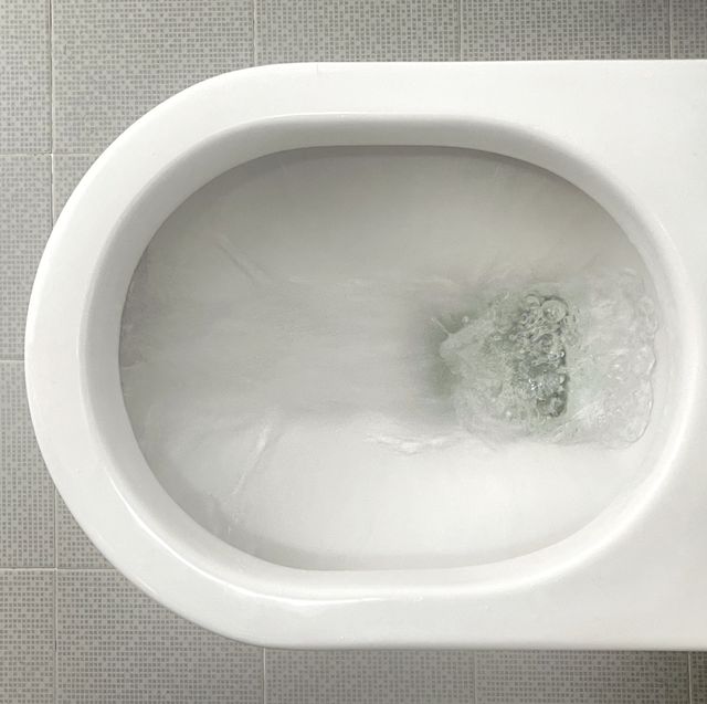 water flushes down toilet bowl