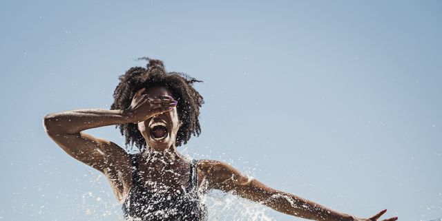 https://hips.hearstapps.com/hmg-prod/images/water-spraying-on-black-woman-dancing-royalty-free-image-1736368026.pjpeg?crop=1.00xw:0.669xh;0,0.150xh&resize=640:*