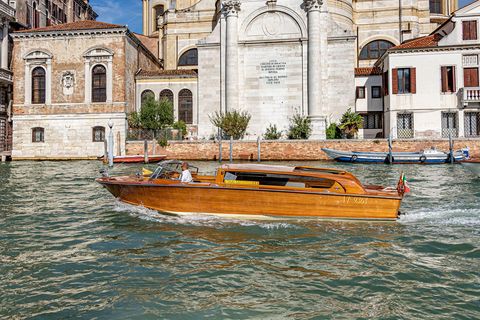 water taxi cruising along the the grand canal in venice italy