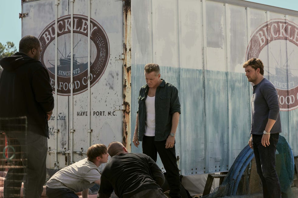 the waterfront. (l to r) brian ashton smith as reggie, joshua brady as hollis, bryan terry snell as levi, holt mccallany as harlan buckley, jake weary as cane buckley in episode 103 of the waterfront. cr. dana hawley/netflix © 2025