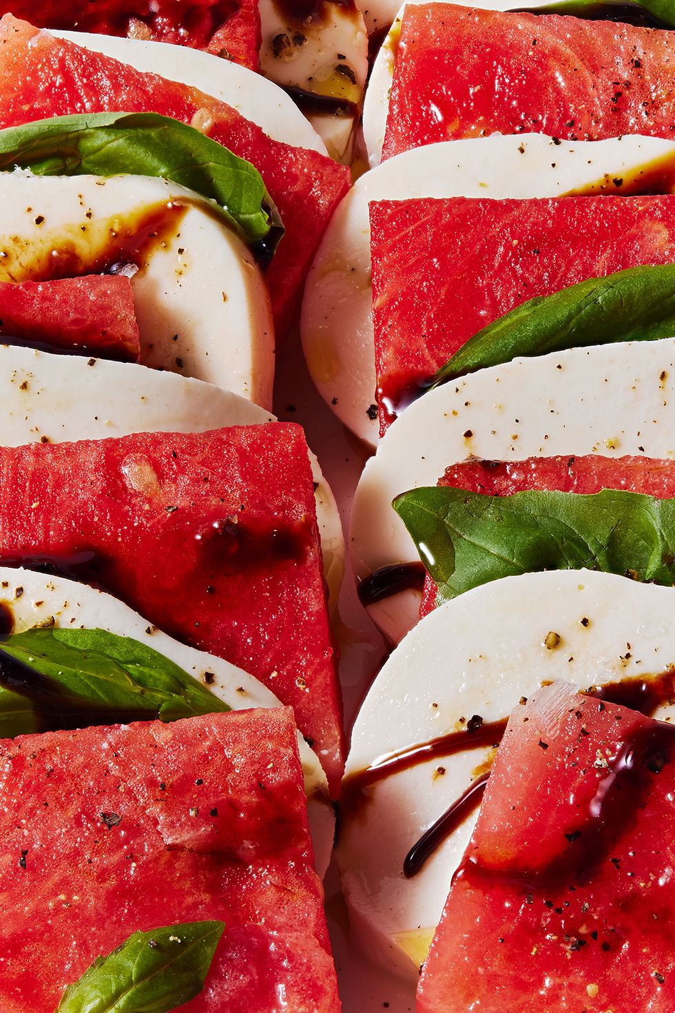 sliced watermelon, mozzarella, and basil drizzled with balsamic