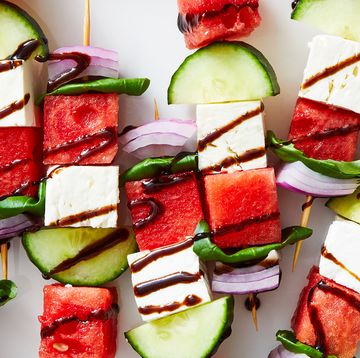 skewers with watermelon, feta, cucumber, basil, and red onion drizzled with a balsamic glaze