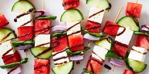 skewers with watermelon, feta, cucumber, basil, and red onion drizzled with a balsamic glaze