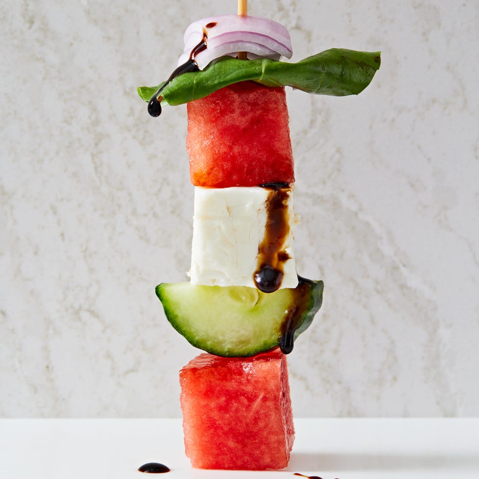 skewers with watermelon, feta, cucumber, basil, and red onion drizzled with a balsamic glaze