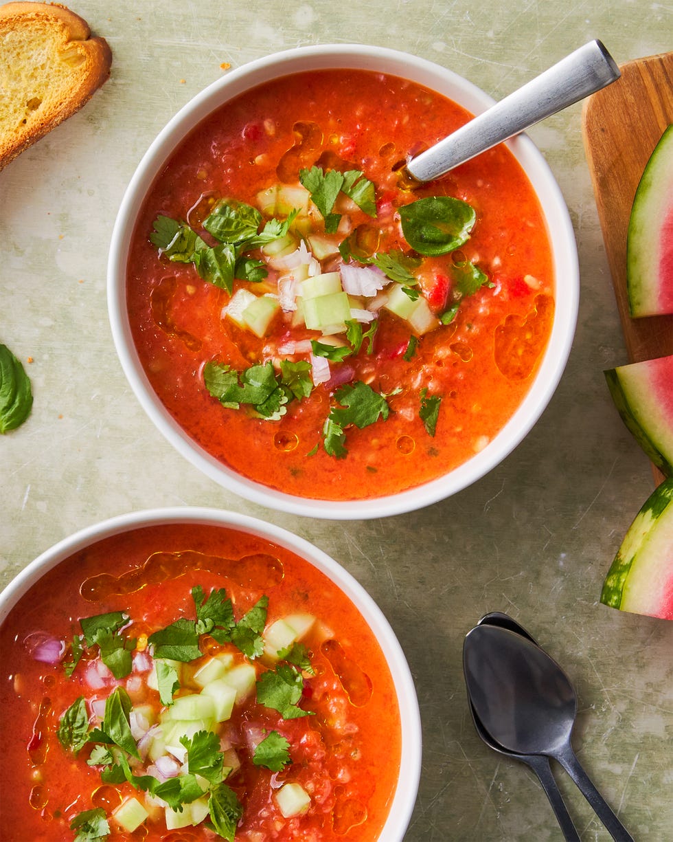 watermelon gazpacho topped with cucumber and red onion