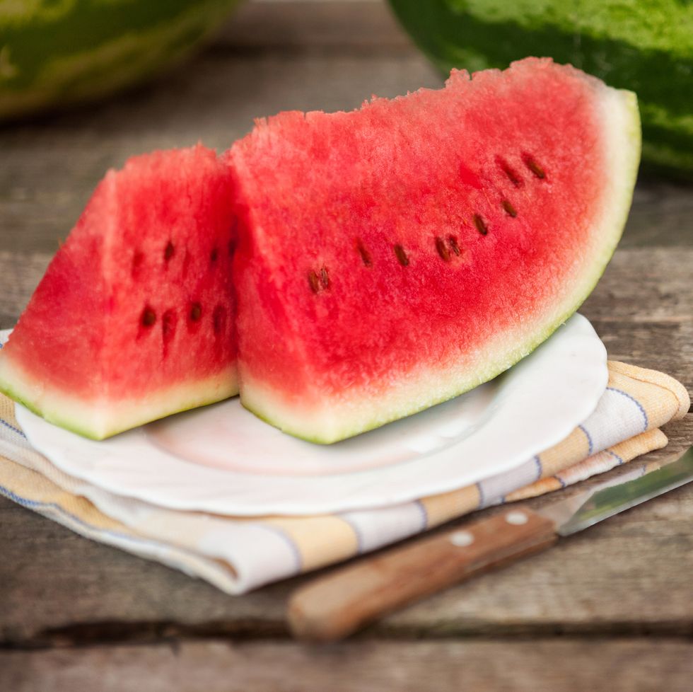 watermelon on plate with knife