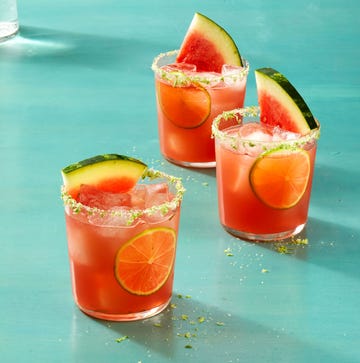 Big-Batch Watermelon Margaritas watermelon margaritas with a watermelon slice as garnish