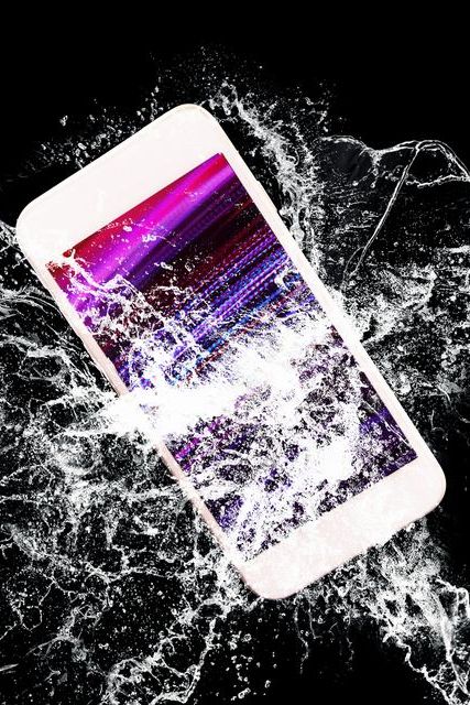 Waterproof phone with splash of water.