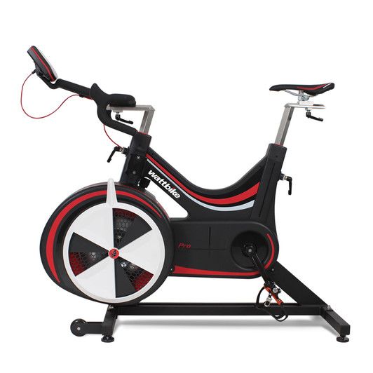 Indoor cycling, Stationary bicycle, Bicycle accessory, Vehicle, Bicycle wheel, Bicycle, Exercise machine, Exercise equipment, Font, Bicycle trainer, 
