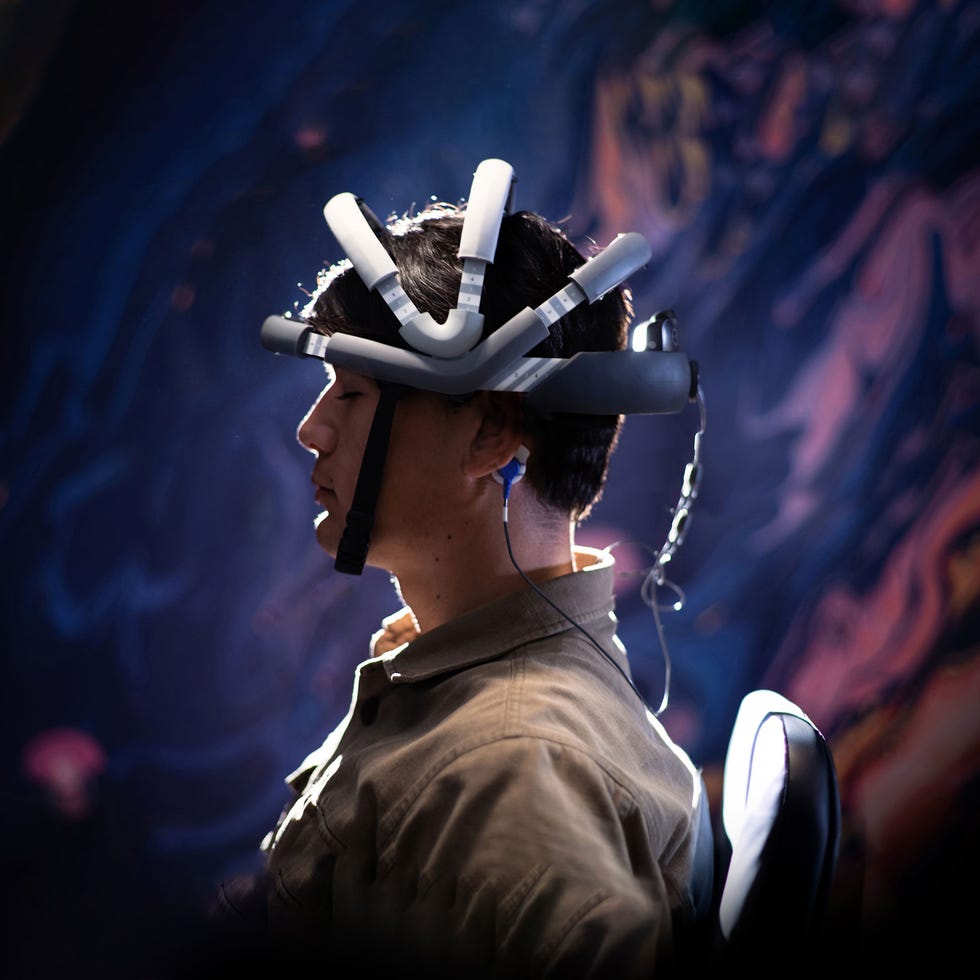 a man wearing a wave neuro headset