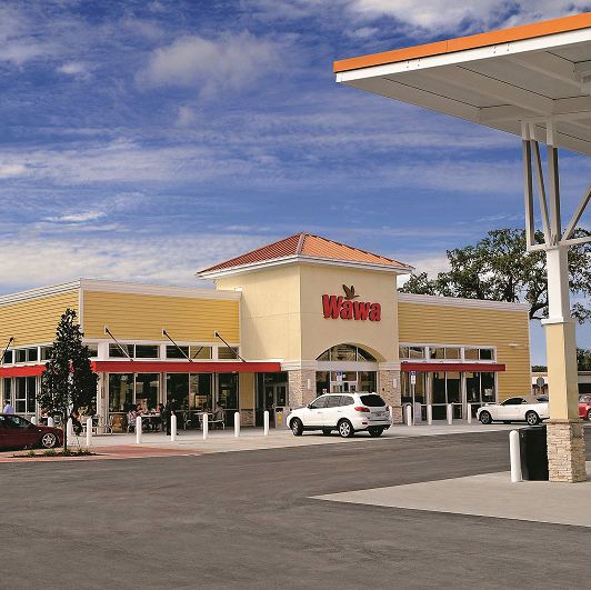 Building, Filling station, Sky, Rest area, Architecture, Gasoline, City, Outlet store, Mixed-use, Plaza, 