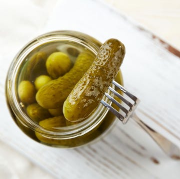 ways to use pickle juice ways to use pickle juice pickles in a jar on a light wooden background. homemade pickles.