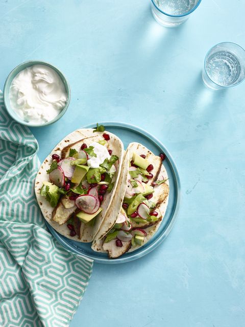 spicy chicken taco with avocado and pomegranate