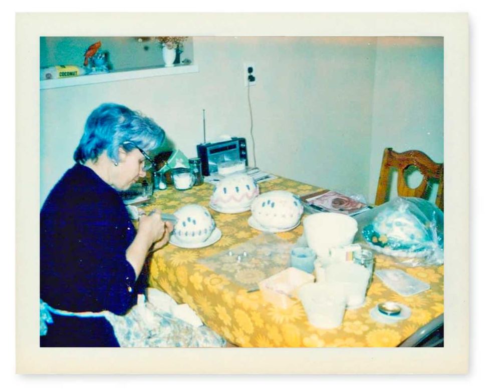 archive photo of grandma clara frosting her easter egg cakes