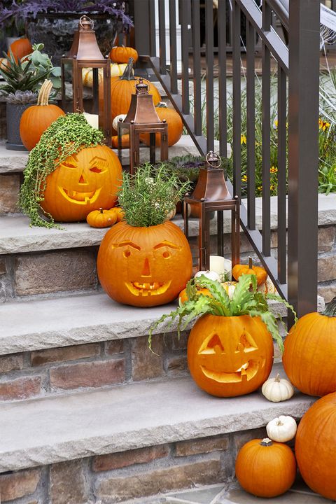 pumpkin carving ideas crazy hair jack o 'lanterns lined up on stone stairs