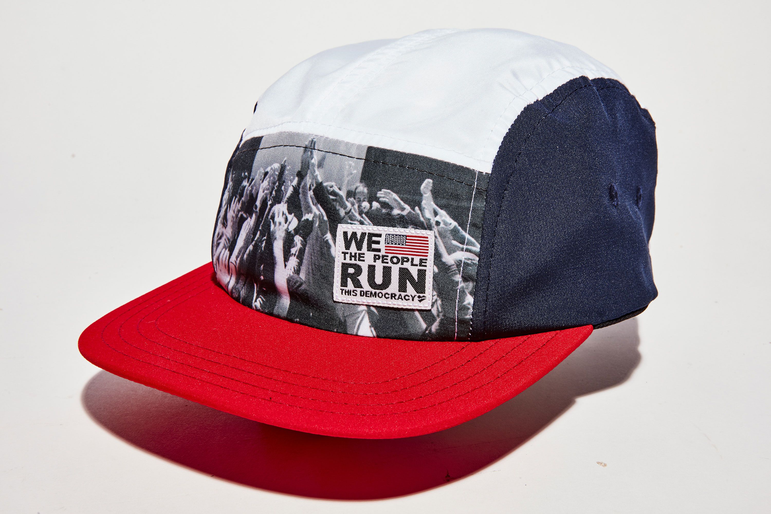 Cap, Clothing, Red, Trucker hat, Baseball cap, Headgear, Design, Fashion accessory, Material property, Font, 