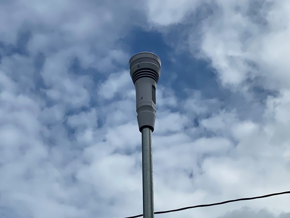 a tall tower with a wire attached