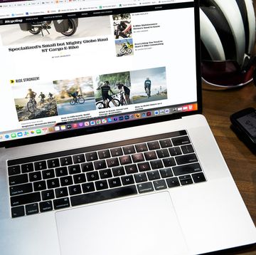 bicycling website on laptop