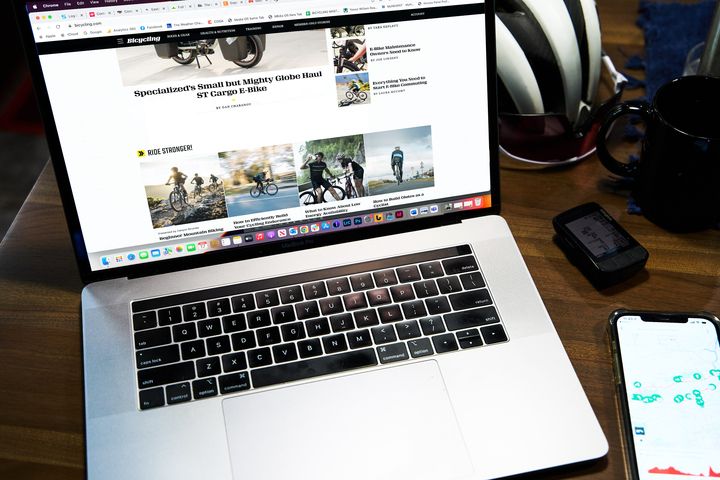bicycling website on laptop
