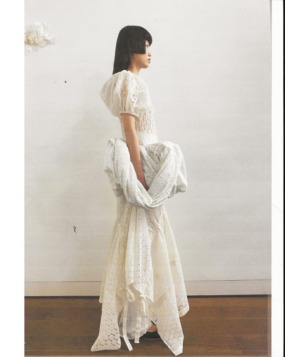 a bride in a wed studio gown
