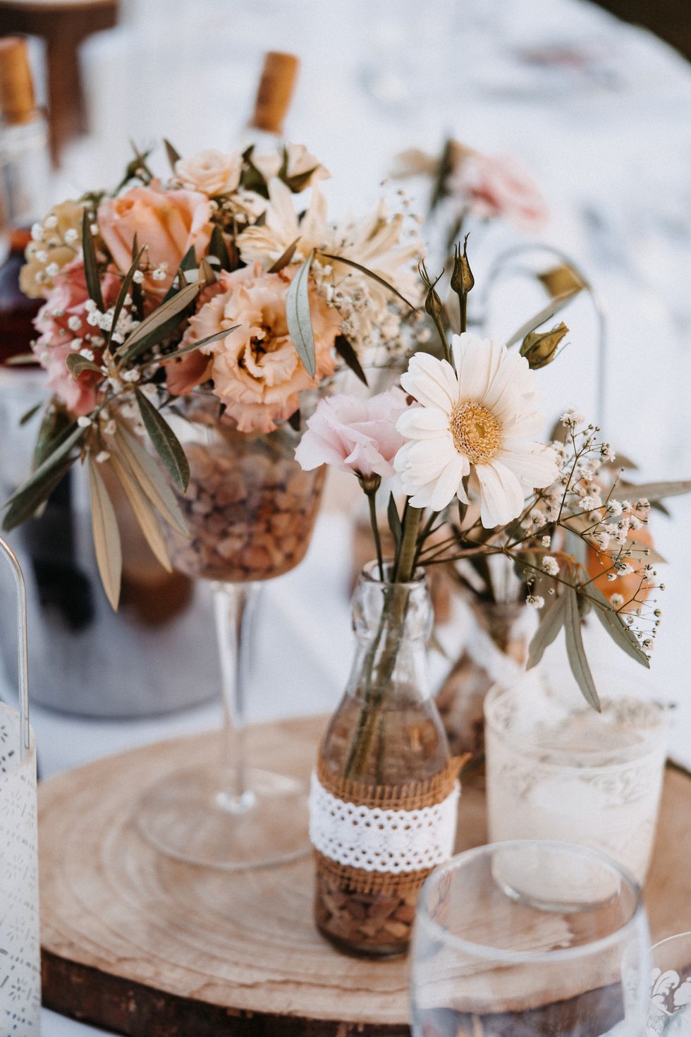 beautiful boho wedding flower table decoration on wood and in majorca selective focus