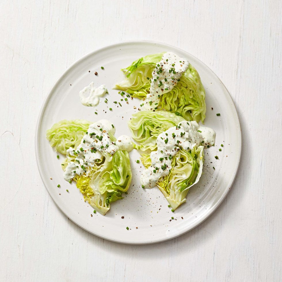 wedge salad with creamy herb dressing on a plate