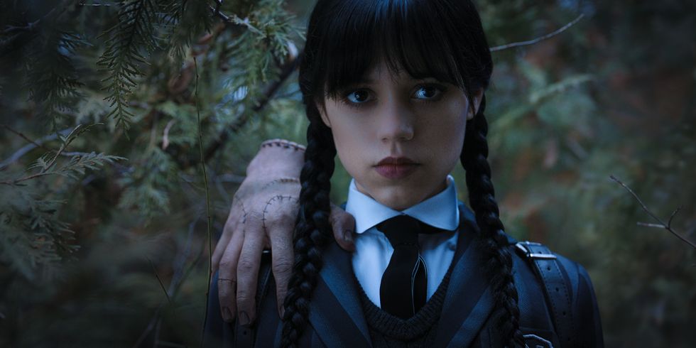 wednesday l to r thing, jenna ortega as wednesday addams in episode 104 of wednesday cr courtesy of netflix © 2022