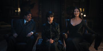 luis guzmán as gomez addams, jenna ortega as wednesday addams and catherine zeta jones as morticia adams in wednesday