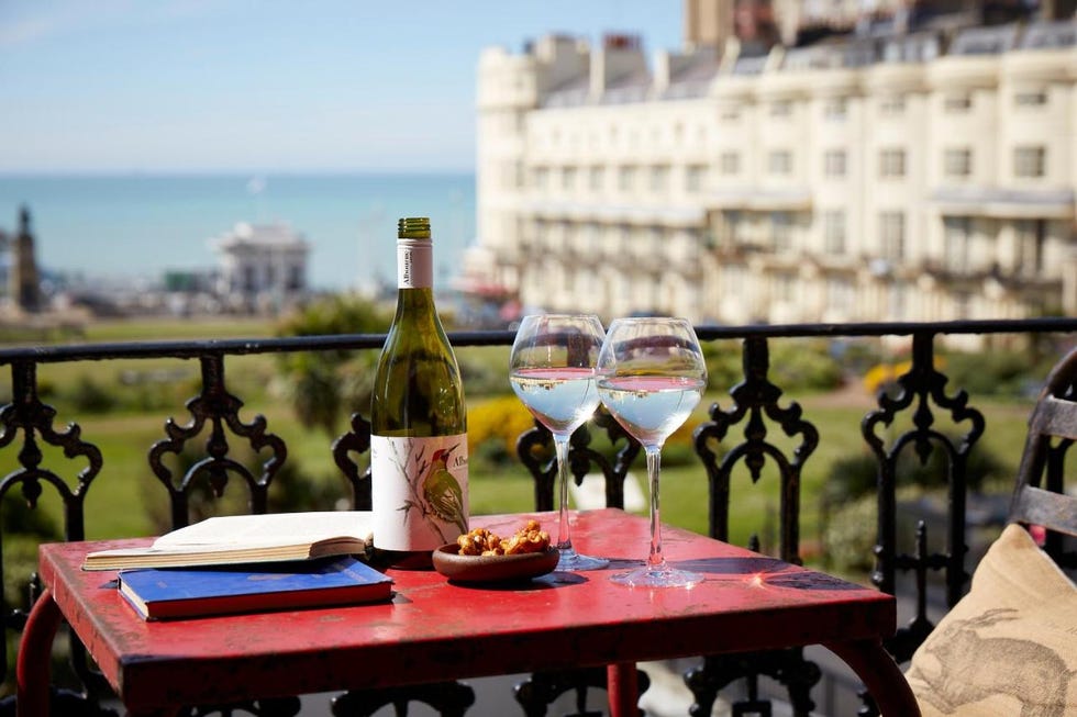 weekend getaways and breaks, a table with wine glasses and a bottle of wine on it