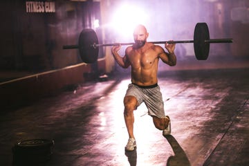 weightlifting strong man on a gym