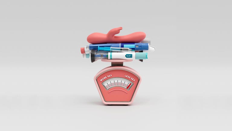 a scale measuring more sex to less sex with medical items and a toy on top