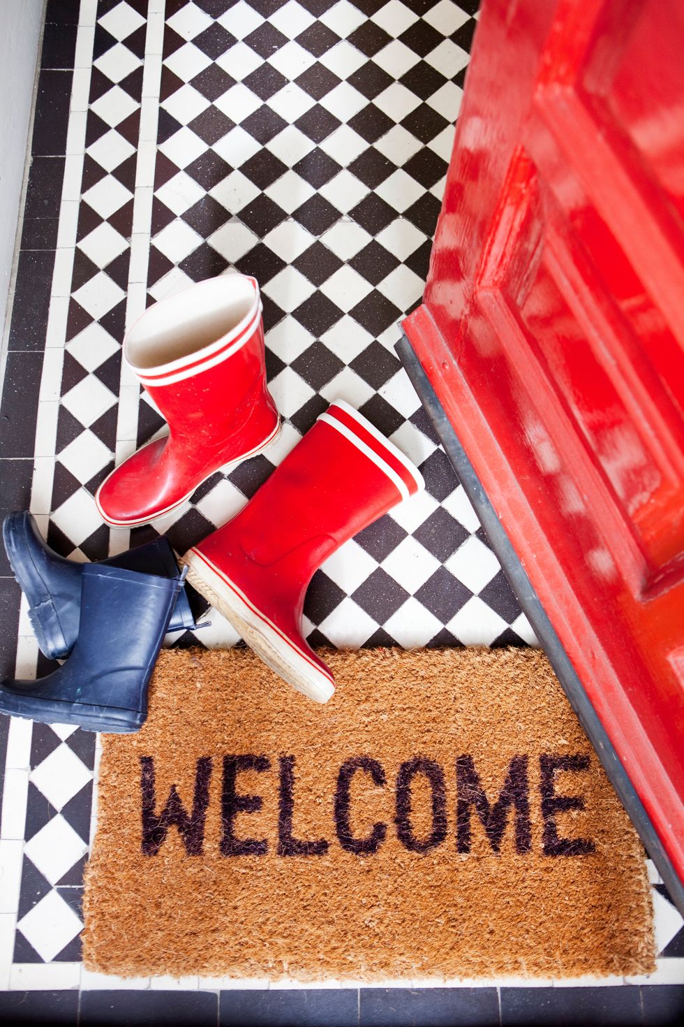 welcome mat and wellington boots