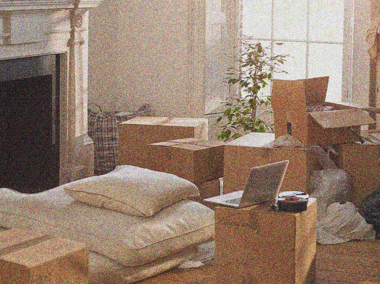 a living room with a laptop