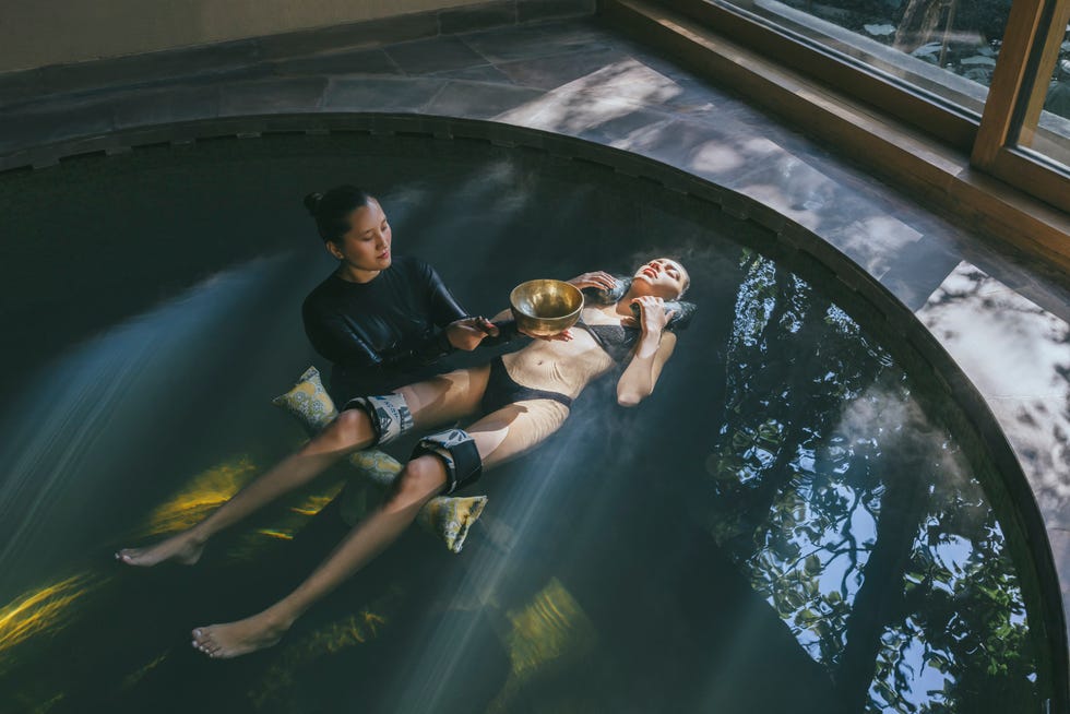 two individuals relaxing in a spa environment