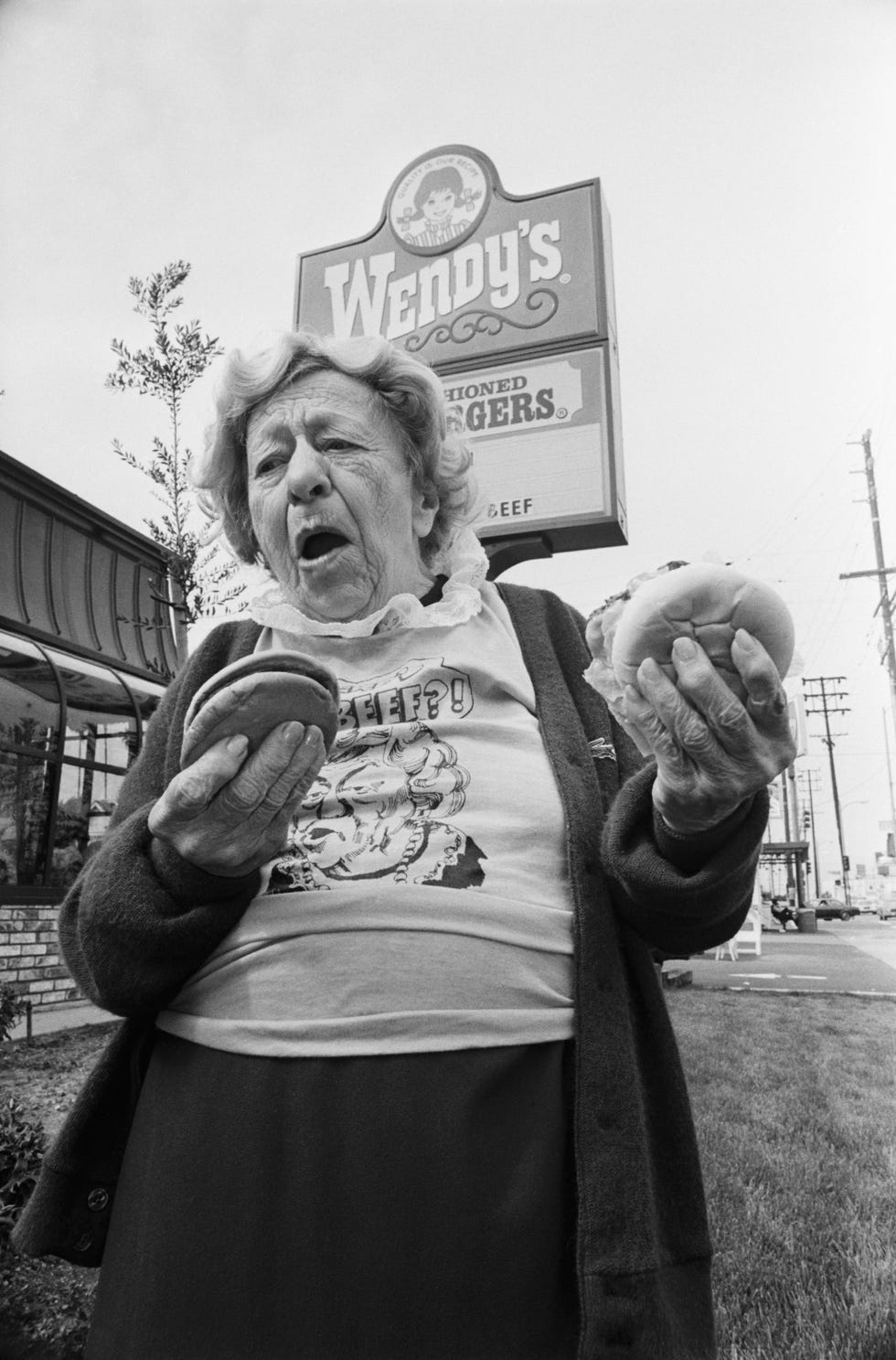 clara peller outside a wendy's restaurant