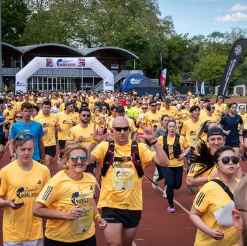 participants seen during wings for life world run at battersea park, london, uk on 5th may 2024
