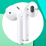 airpods on green background