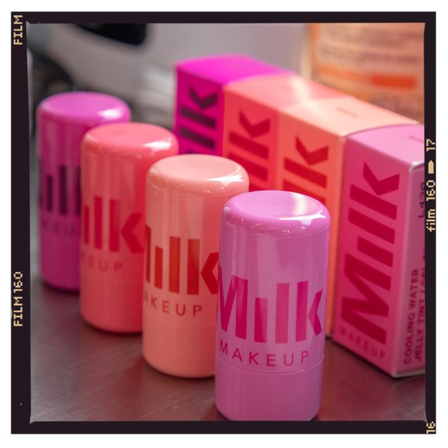 a group of pink cans