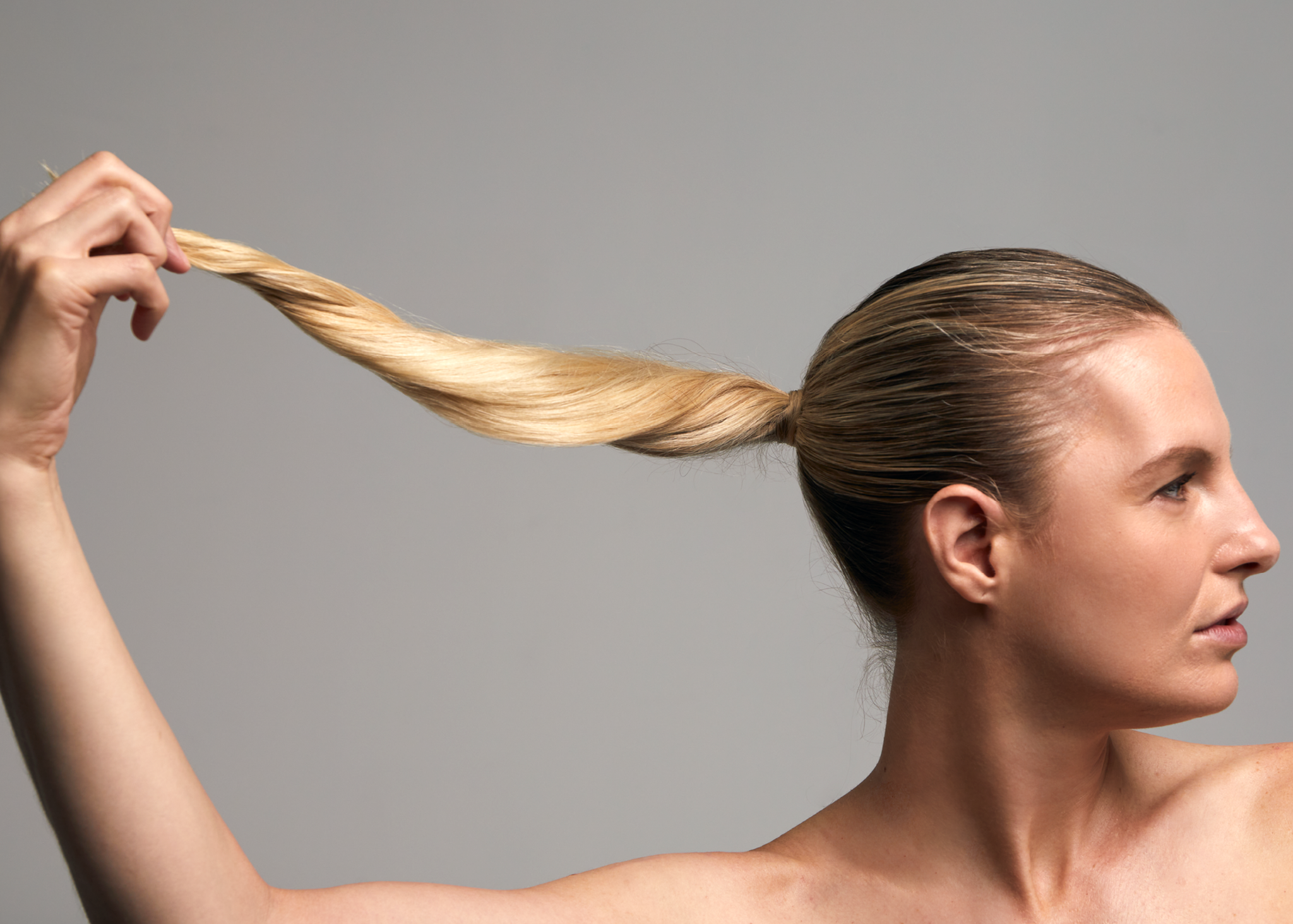 a woman with blonde thin hair