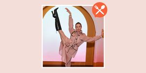 dancer isabella boylston performing pose in trench coat