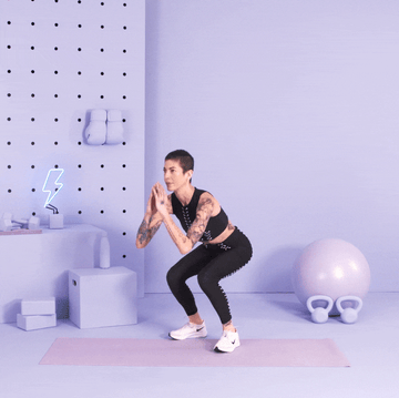 trainer Leigh Gerson performing squat trainer leigh gerson performing squat