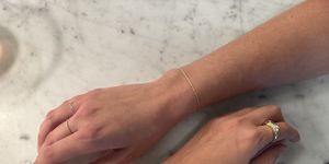 two gh editors show their catbird permanent bracelets