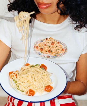 a woman with a plate of food