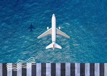 a plane flying over a sea