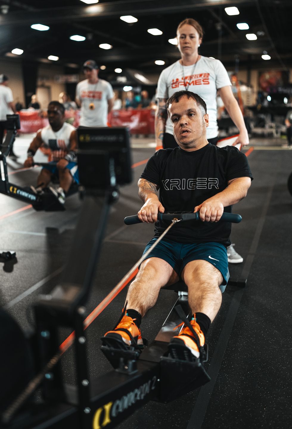 a man on a rowing machine
