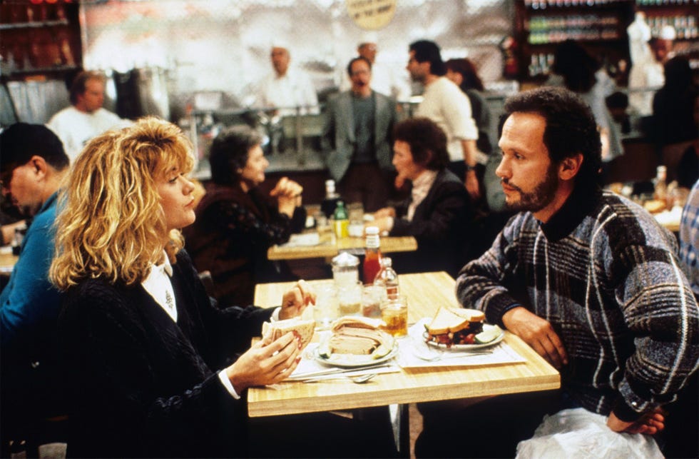 restaurant scene featuring two individuals dining at a table