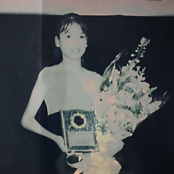 jennifer pan as a child holding an award and flowers
