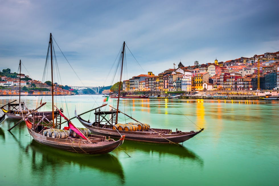 porto, portugal old town cityscape on the douro river with traditional rabelo boats